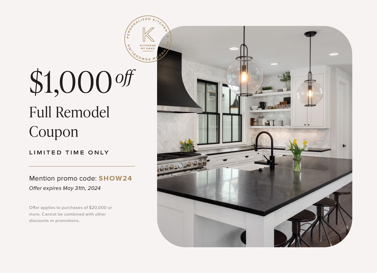 Modern kitchen with black countertop and white cabinets. $1000 off full remodel coupon.