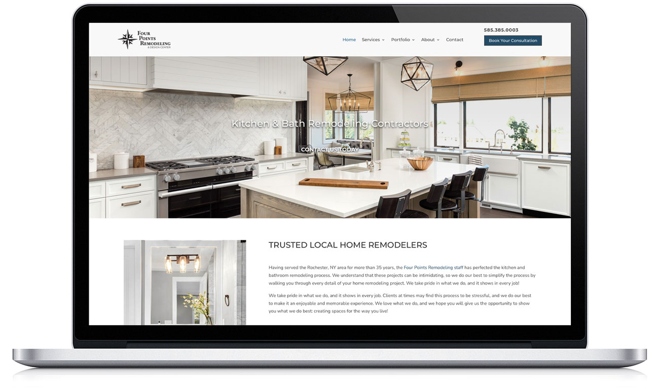 A laptop screen displaying a modern kitchen design webpage. The webpage features a large image of a sleek kitchen.