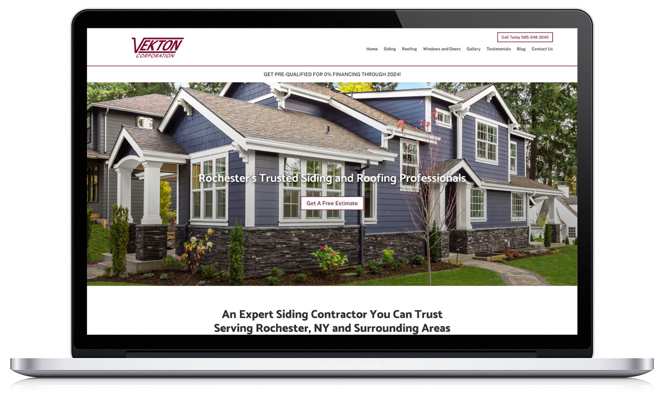 A laptop showing a roofing company's website on screen. The website features a blue house with white trim and a stone foundation.