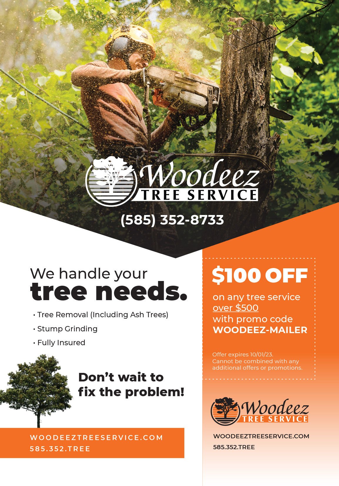 Man in orange vest and hard hat cutting tree branches